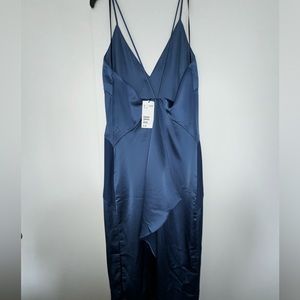 New with tags size 12 H&M dress! Small water stain probably removed once washed!